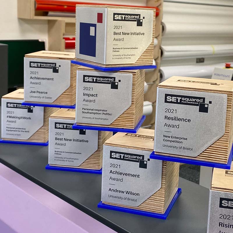 SETsquared award blocks with folded aluminium faceplates and laminated birch ply – custom university recognition trophies
