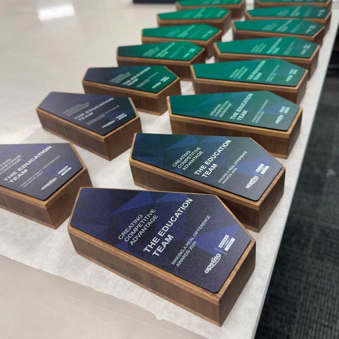 Production of bespoke bamboo awards with dark colour finish | More Awards