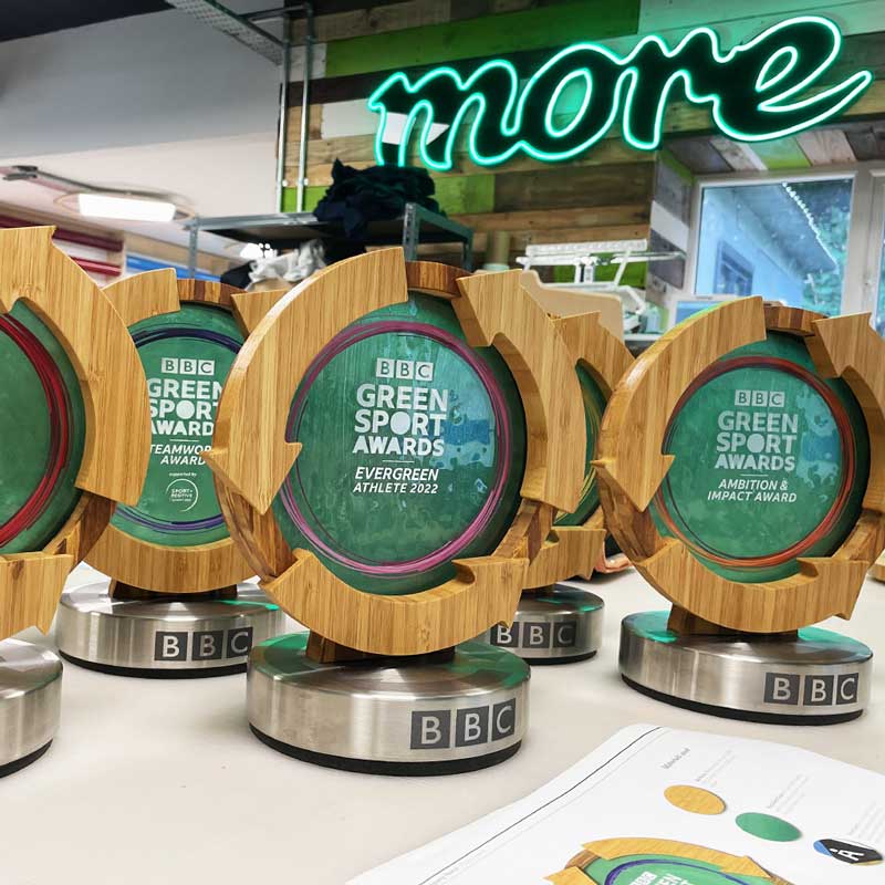 Stainless steel Award Bases with custom recycled glass and bamboo logo detail | More awards