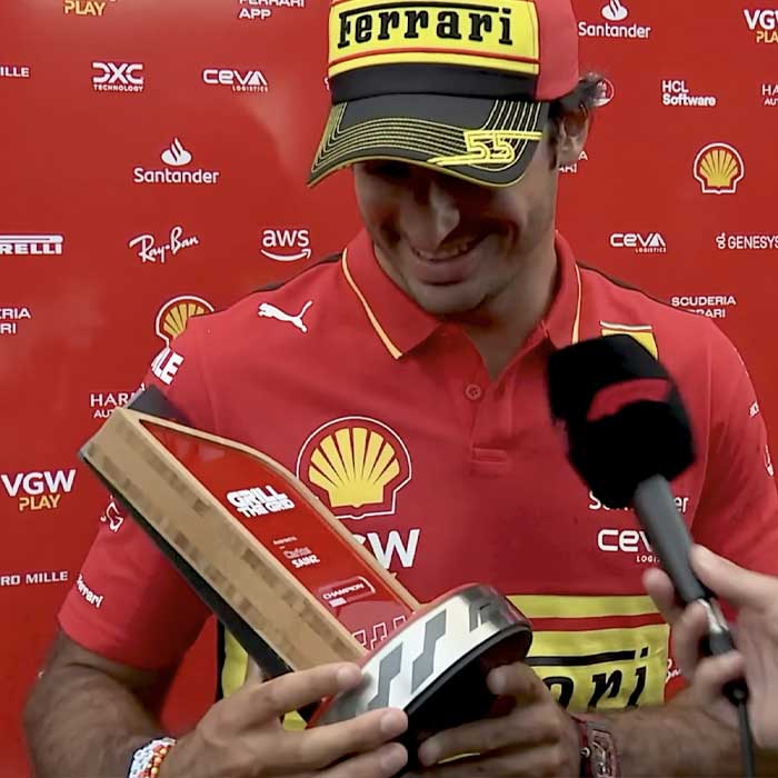 Carlos Sainz reciving bespoke sustainable trophy produced by More Awards
