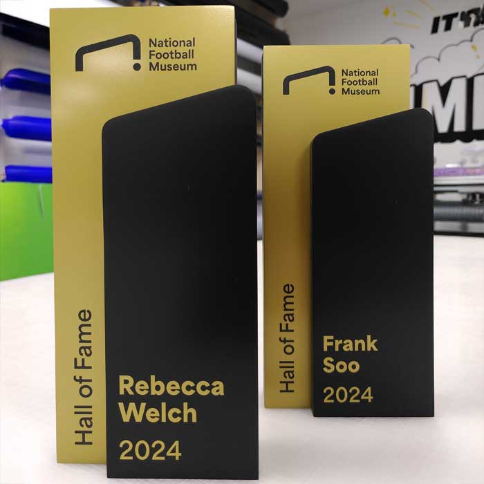 Quality Eco stone football awards in black and gold.