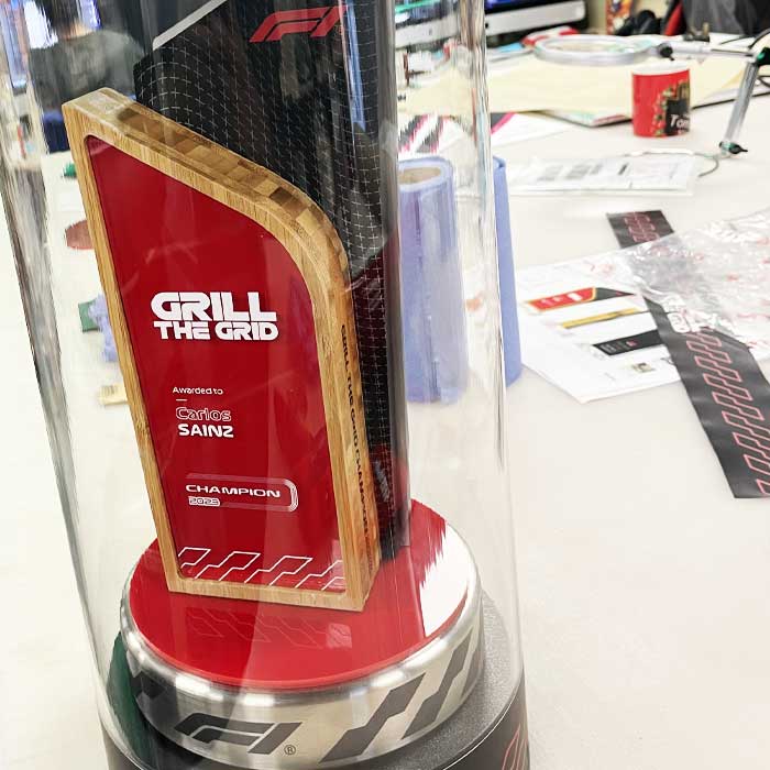 Custom Award display tube with Formula 1 Trophy | More awards
