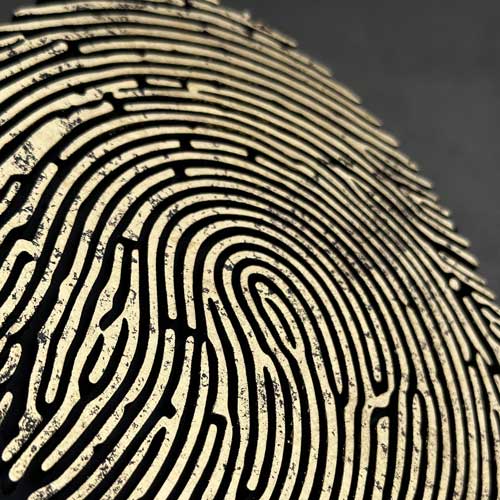 Gilded fingerprint bespoke award in production – crafted by More Awards
