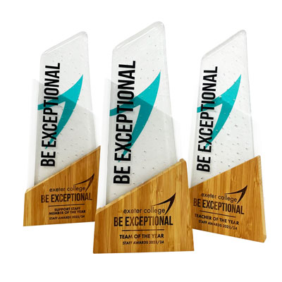 Tactile sustainable trophy - kiln-fired recycled glass combined with renewable bambo with premium finish