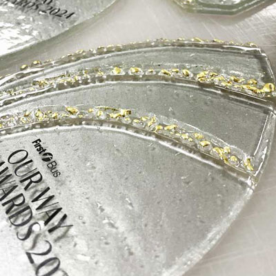 Sustainability award with glass and gold detial
