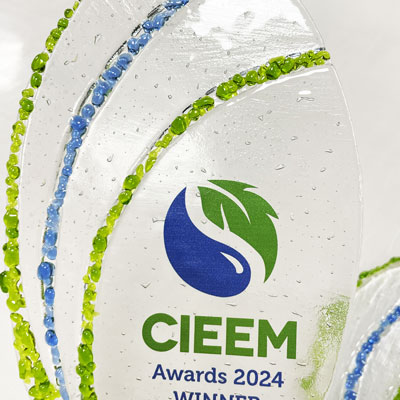 Striking recycled glass trophy with customised plinth, crafted with care.