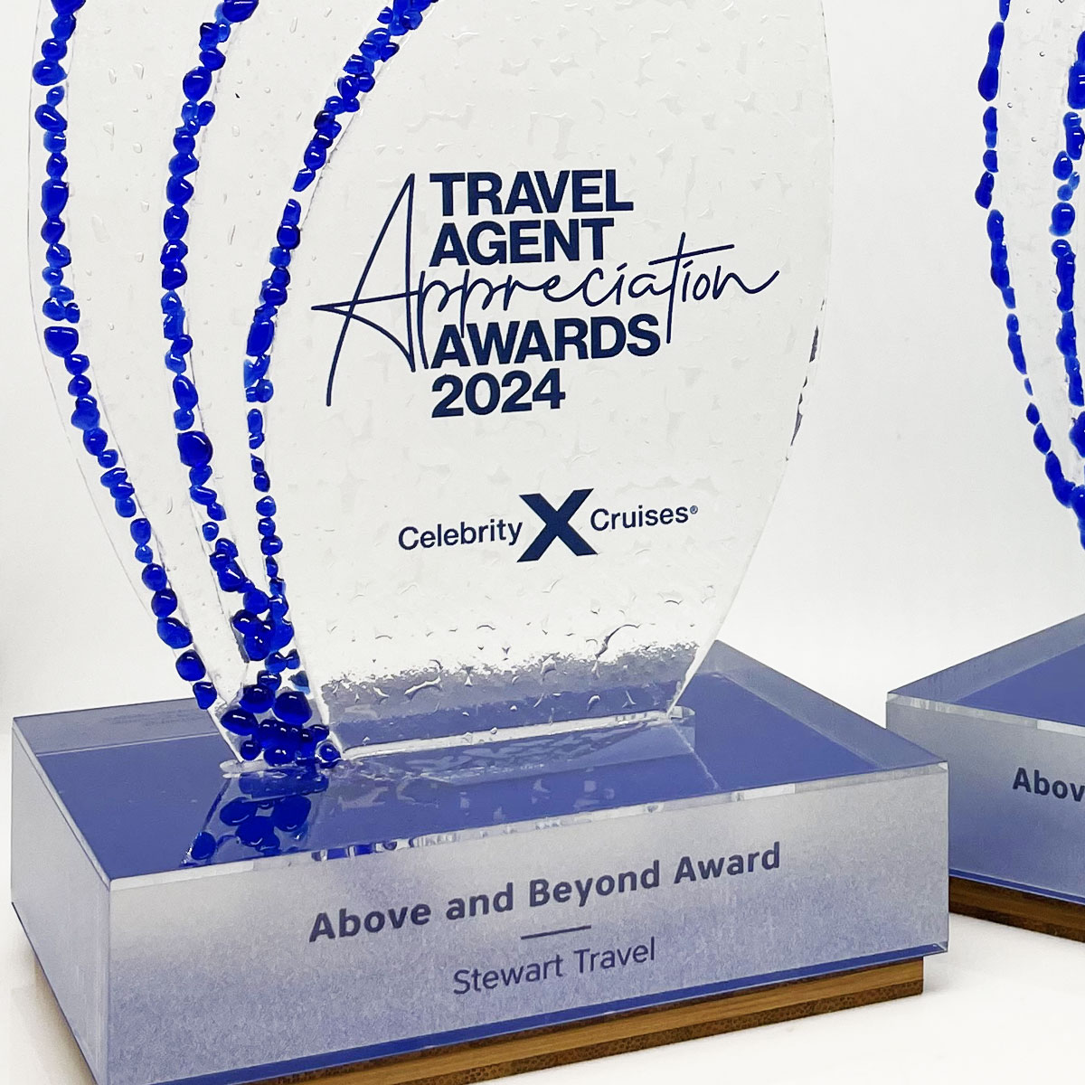 Sustainable award made with kiln-fired glass and a clear acrylic base, designed by More Awards for eco-conscious corporate and community events