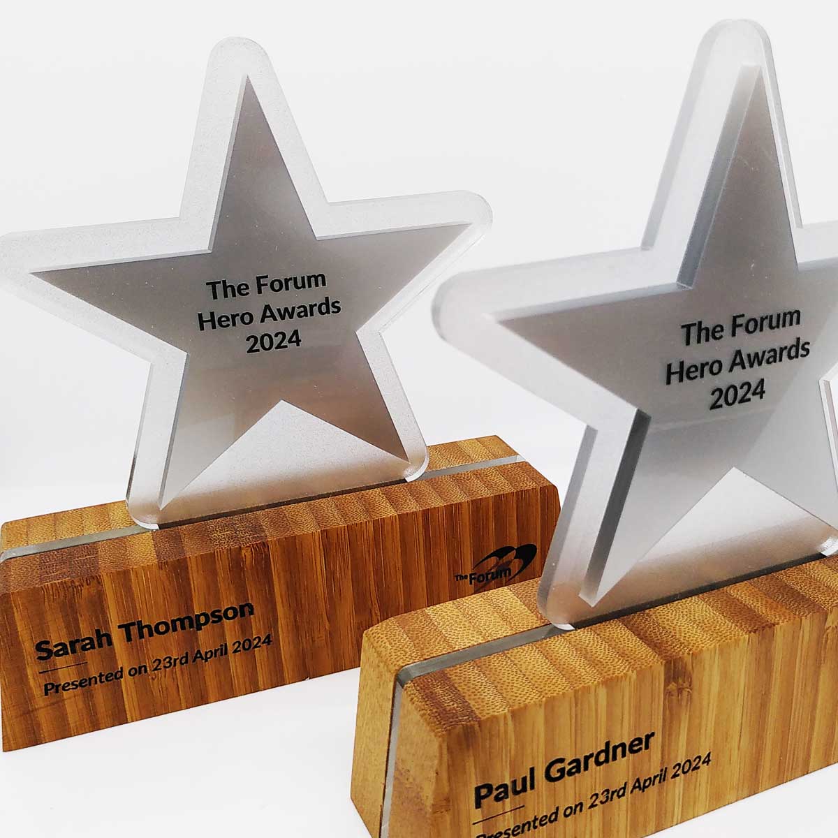 Dorn corporate trophy with bamboo base and acrylic star, created by More Awards for staff recognition and partnership awards