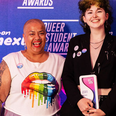 Smooth white Eco Stone trophy for queer student awards