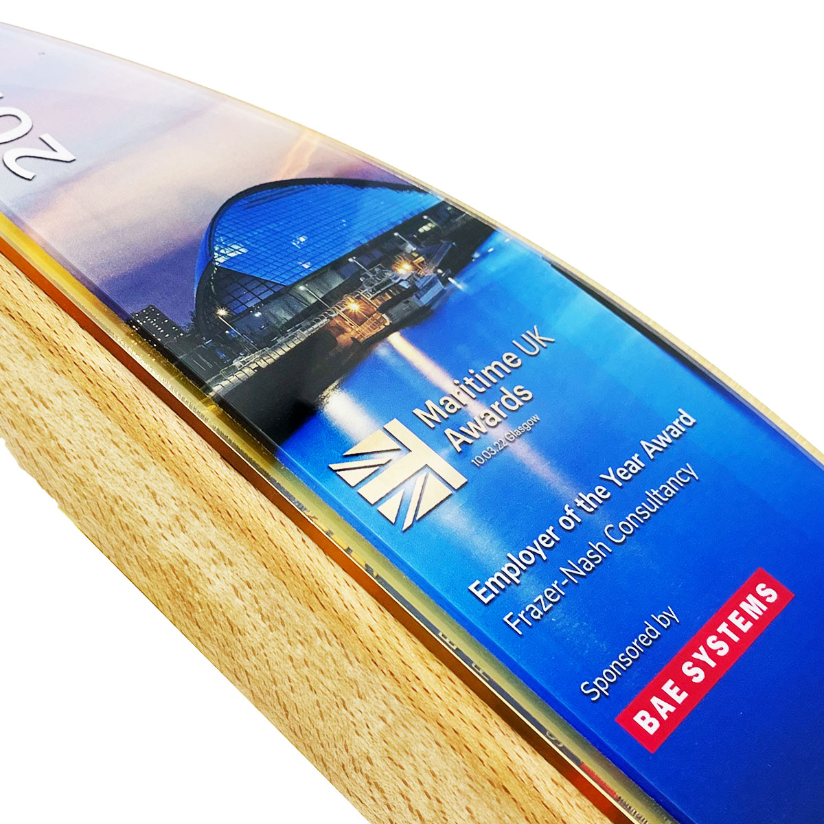 Sail-shaped award in sustainably sourced timber with recycled acrylic detail, handcrafted by More Awards for maritime and eco-focused recognition events