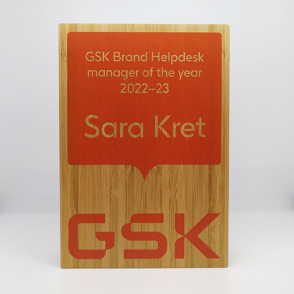 Sustainable trophy made from post-consumer acrylic and responsibly sourced bamboo | by More Awards