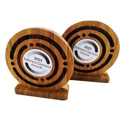 Premium round bamboo shape awards with custom logo detail by More Awards