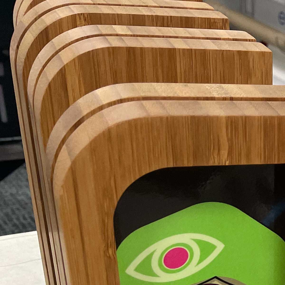 Bamboo frame style trophy with custom printed metal plaque, designed by More Awards for community service recognition and charity leadership awards