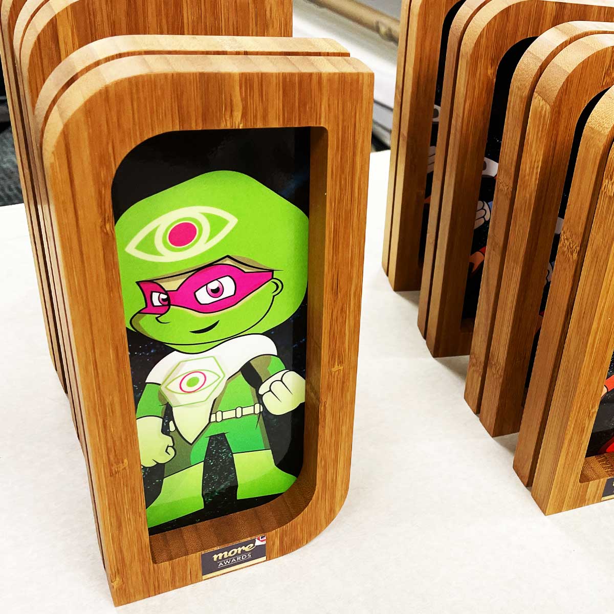 Superhero full-colour printed bamboo frame award designed by More Awards for environmental leadership, climate action, and sustainability events