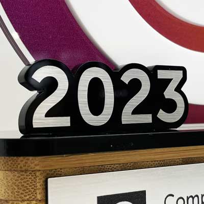 Circular acrylic trophy with 3D date detail