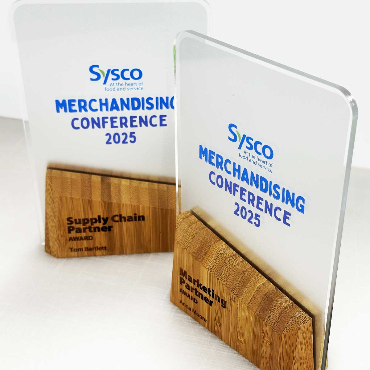 Contemporary Kytto award featuring green recycled glass and sustainable bamboo detailing | by More Awards