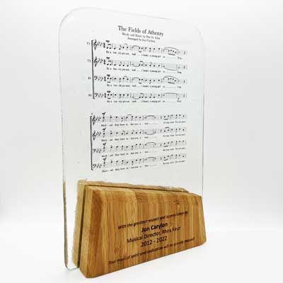 Musinc industry awards with song sheet notes printed within award design