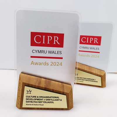 Corporate awards with gold plaque for excellence by More Awards