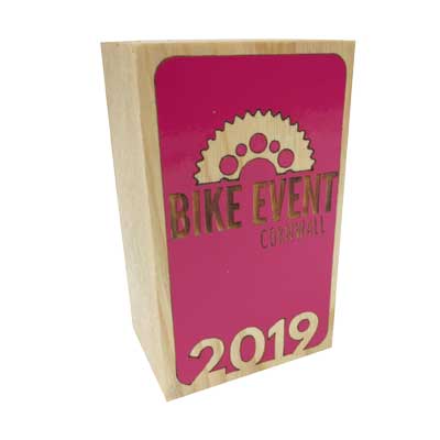 Wooden block style award with cycle event branding