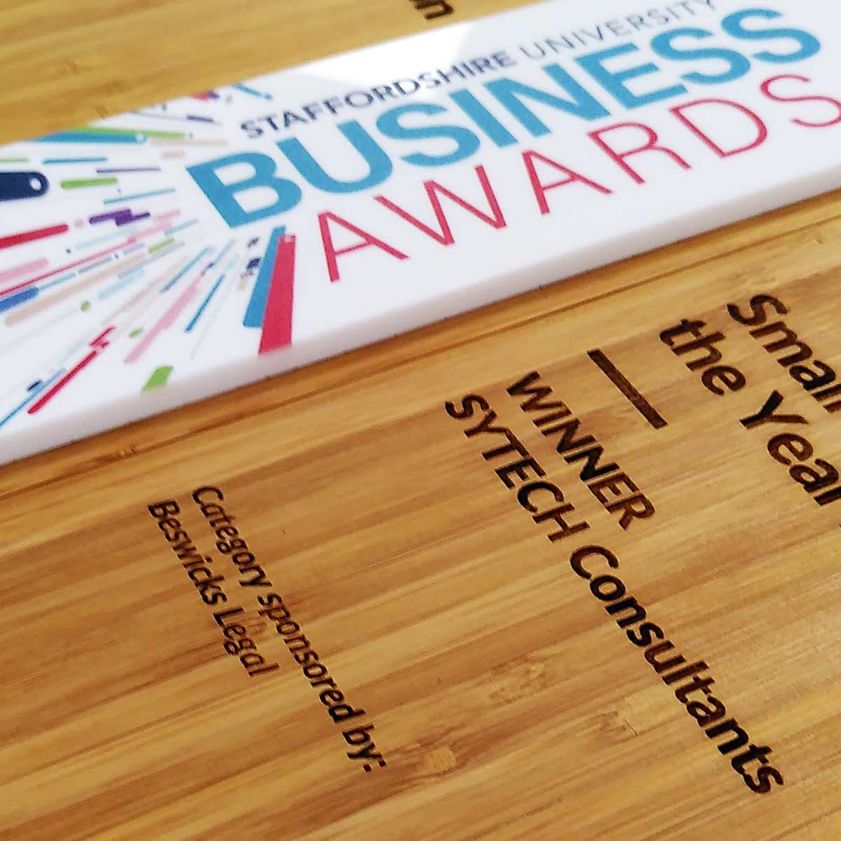 White acrylic 3D detail on face of customisable awards with premium finish | by More Awards