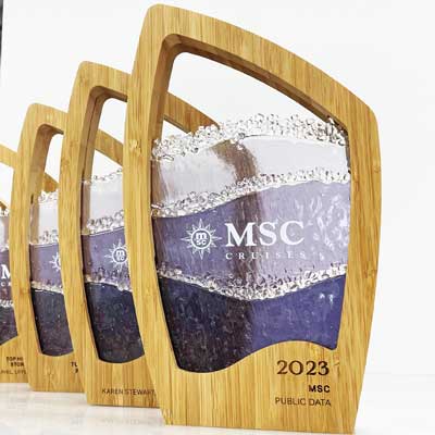 Cruise ship company awards with sparkle glass detail and wave pattern by More Awards