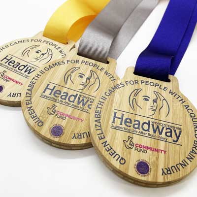 Sport medals and team of the year medals with custom printed graphics and choice of ribbon colours