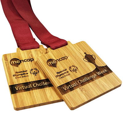 Quality bespoke bamboo medals with grossgrain ribbon
