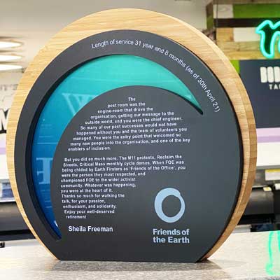 Friends of the Earth awards with sustainable bamboo and recycled arcylic inlays | by More Awards