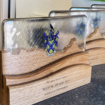 Town mayor awards incorporating landscape and produced with fallen tree wood and recycled glass