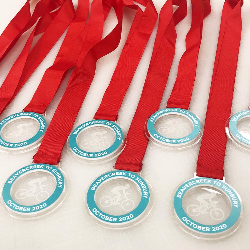 Cycling event medals with ribbons